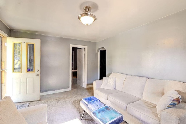 261 Superior St, Mansfield, OH 44902 - living room with arched walkways and light colored carpet