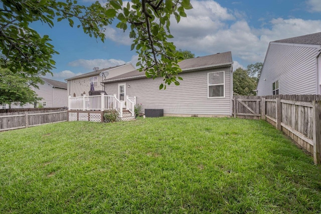 2621 Edencreek Ln, Columbus, OH 43207 - back of house featuring a wooden deck and a fenced backyard