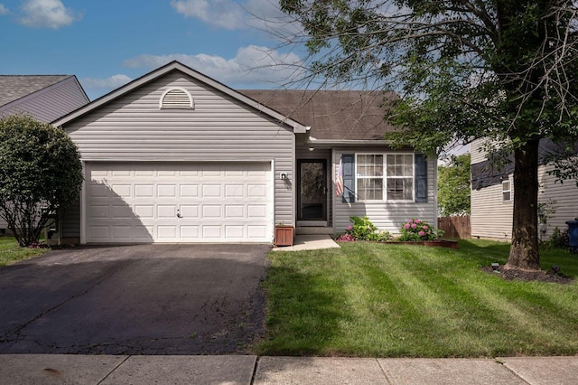 2621 Edencreek Ln, Columbus, OH 43207 - ranch-style home with an attached garage, a front yard, and driveway