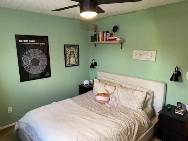 796 Cap Ln Unit 21C, Columbus, OH 43085 - bedroom with carpet and a ceiling fan