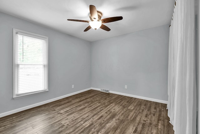 1533 Sandringham Ct, Columbus, OH 43220 - spare room with a ceiling fan and dark wood-style flooring