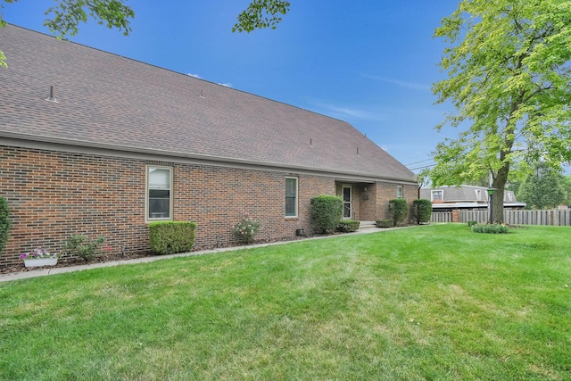 1533 Sandringham Ct, Columbus, OH 43220 - rear view of property with roof with shingles and brick siding