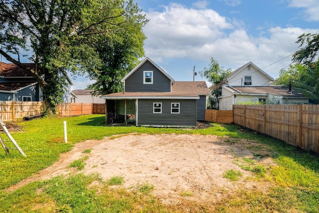 324 Quarry St, Marion, OH 43302 - back of property with a fenced backyard and roof with shingles