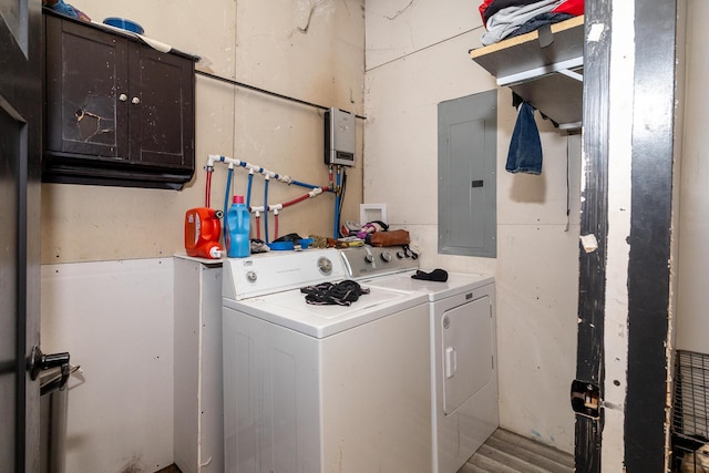 324 Quarry St, Marion, OH 43302 - washroom featuring cabinet space, electric panel, and washer and clothes dryer