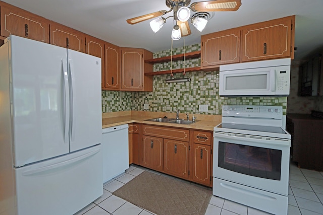 5278 Edgeview Rd, Columbus, OH 43207 - kitchen with white appliances, light countertops, open shelves, ceiling fan, and brown cabinetry