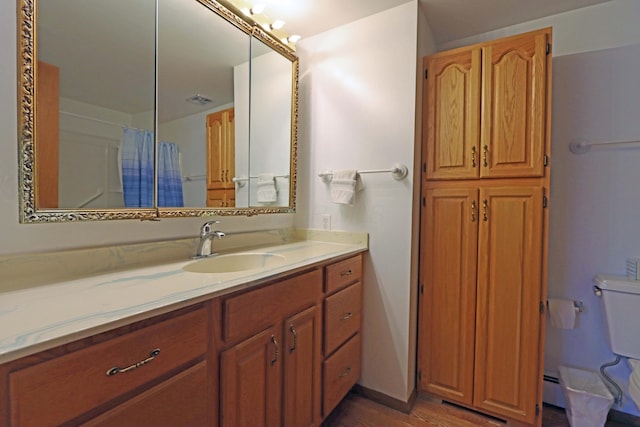 5278 Edgeview Rd, Columbus, OH 43207 - full bath featuring vanity and wood finished floors