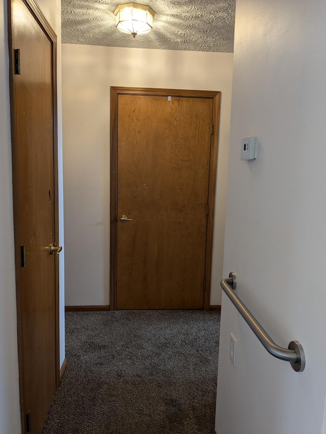 5813 Thada Ln, Columbus, OH 43229 - hall featuring a textured ceiling and carpet