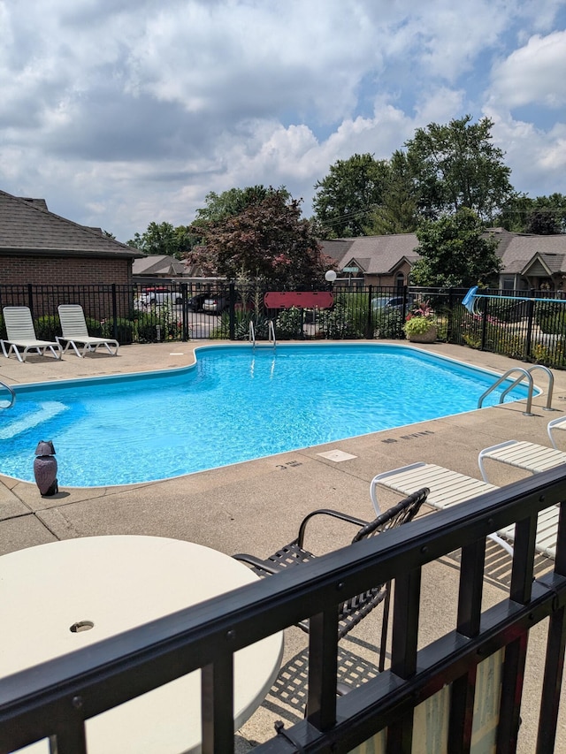 5813 Thada Ln, Columbus, OH 43229 - community pool featuring a patio area