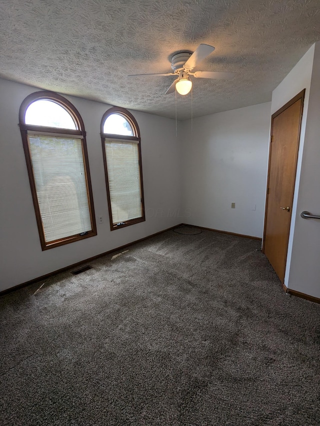 5813 Thada Ln, Columbus, OH 43229 - unfurnished room with a ceiling fan, carpet flooring, and a textured ceiling