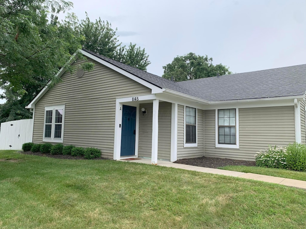 1145 Coventry Way Unit A, Marysville, OH 43040 - ranch-style home with a front lawn and roof with shingles