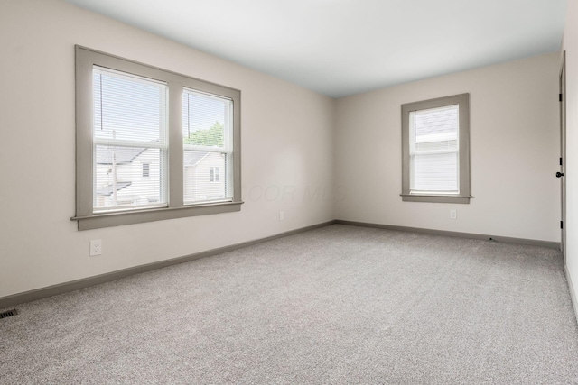 139 S Princeton Ave, Columbus, OH 43222 - spare room featuring carpet flooring and baseboards