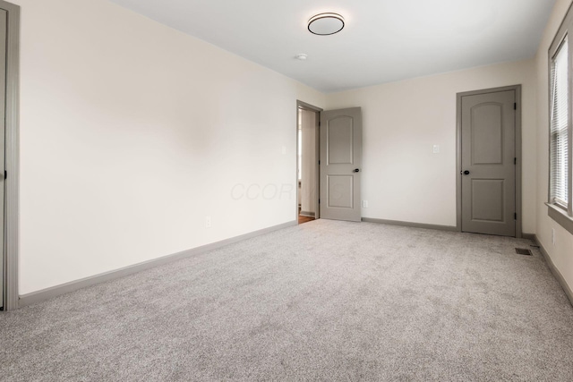 139 S Princeton Ave, Columbus, OH 43222 - empty room featuring light carpet and baseboards
