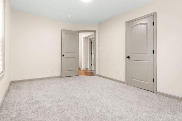 139 S Princeton Ave, Columbus, OH 43222 - carpeted spare room with baseboards and a smoke detector