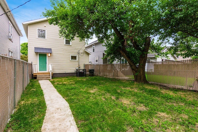 139 S Princeton Ave, Columbus, OH 43222 - back of house featuring entry steps and a fenced backyard