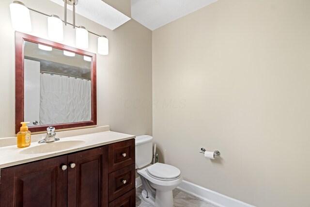 2635 Youngs Grove Rd, Columbus, OH 43231 - full bath featuring vanity and marble finish floors