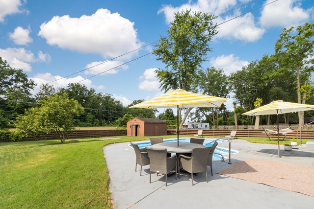 2635 Youngs Grove Rd, Columbus, OH 43231 - fenced backyard featuring a shed, a patio area, and outdoor dining area