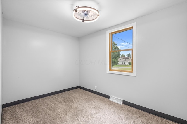 5369 Quincy St, Harpster, OH 43323 - spare room with baseboards and carpet floors