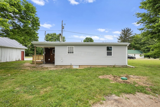 5369 Quincy St, Harpster, OH 43323 - rear view of property with a lawn