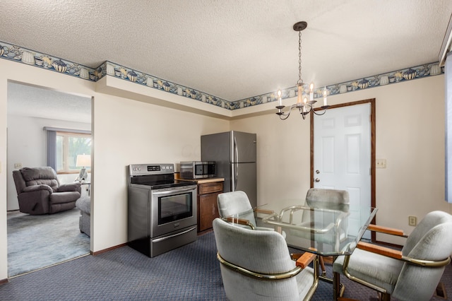 229 Danbury Rd, West Jefferson, OH 43162 - dining space featuring a chandelier, dark carpet, and a textured ceiling