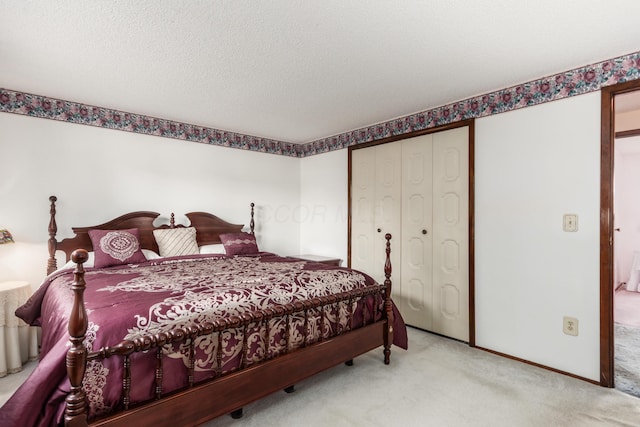 229 Danbury Rd, West Jefferson, OH 43162 - carpeted bedroom featuring a closet and a textured ceiling