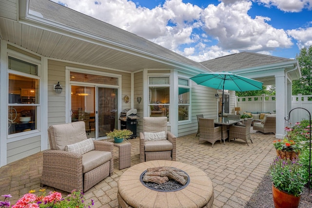 6918 Rothwell St, New Albany, OH 43054 - view of patio with area for grilling and an outdoor living space with a fire pit