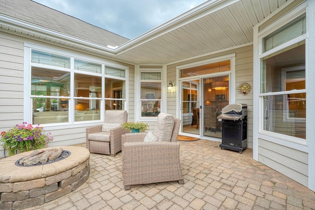 6918 Rothwell St, New Albany, OH 43054 - view of patio / terrace with a fire pit and grilling area