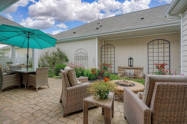 6918 Rothwell St, New Albany, OH 43054 - view of patio / terrace with a fire pit and outdoor dining area