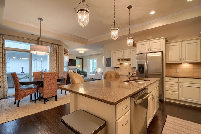 6918 Rothwell St, New Albany, OH 43054 - kitchen with appliances with stainless steel finishes, dark wood-type flooring, ornamental molding, decorative backsplash, and decorative light fixtures