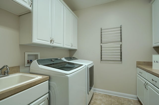6918 Rothwell St, New Albany, OH 43054 - laundry area with cabinet space and washing machine and dryer