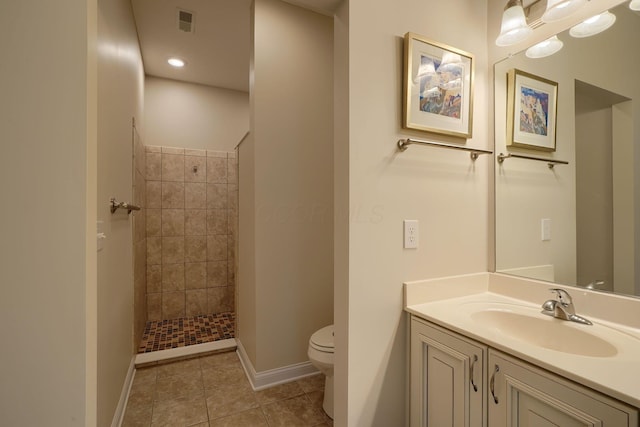 6918 Rothwell St, New Albany, OH 43054 - full bathroom with a tile shower, vanity, tile patterned floors, and recessed lighting
