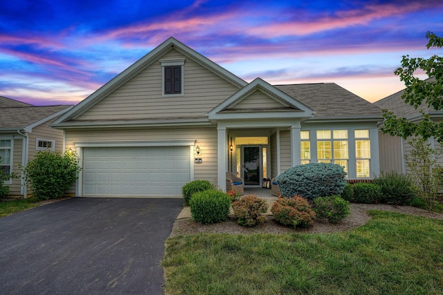 6918 Rothwell St, New Albany, OH 43054 - traditional-style house with asphalt driveway and an attached garage