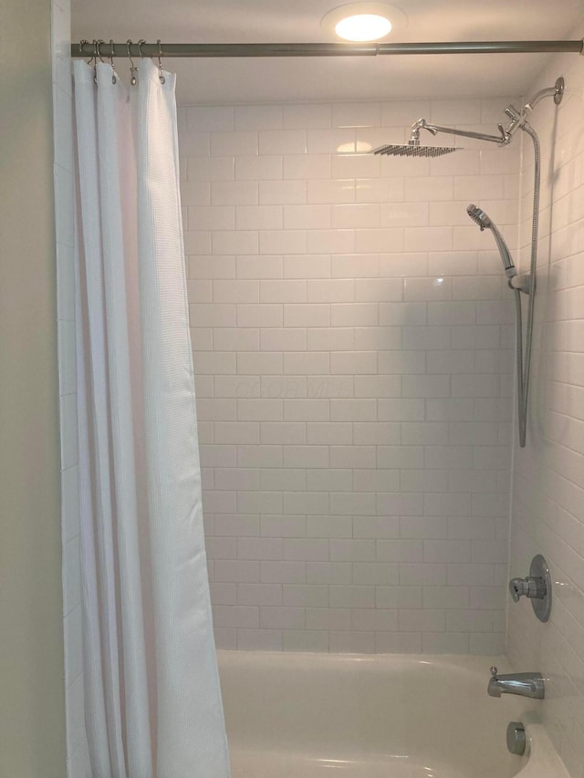 1276 N High St Unit 206, Columbus, OH 43201 - full bathroom featuring shower / bath combo with shower curtain