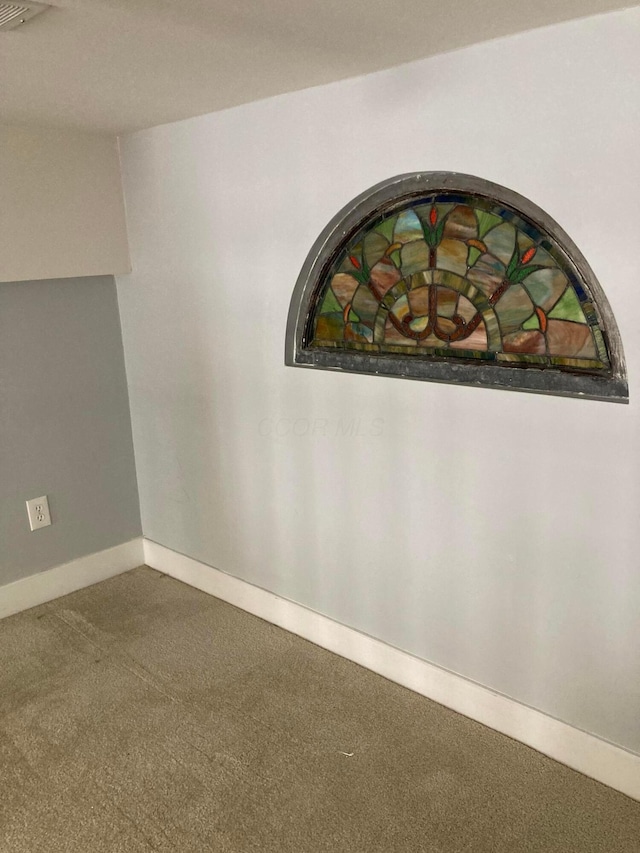 1276 N High St Unit 206, Columbus, OH 43201 - detailed view of carpet floors and baseboards
