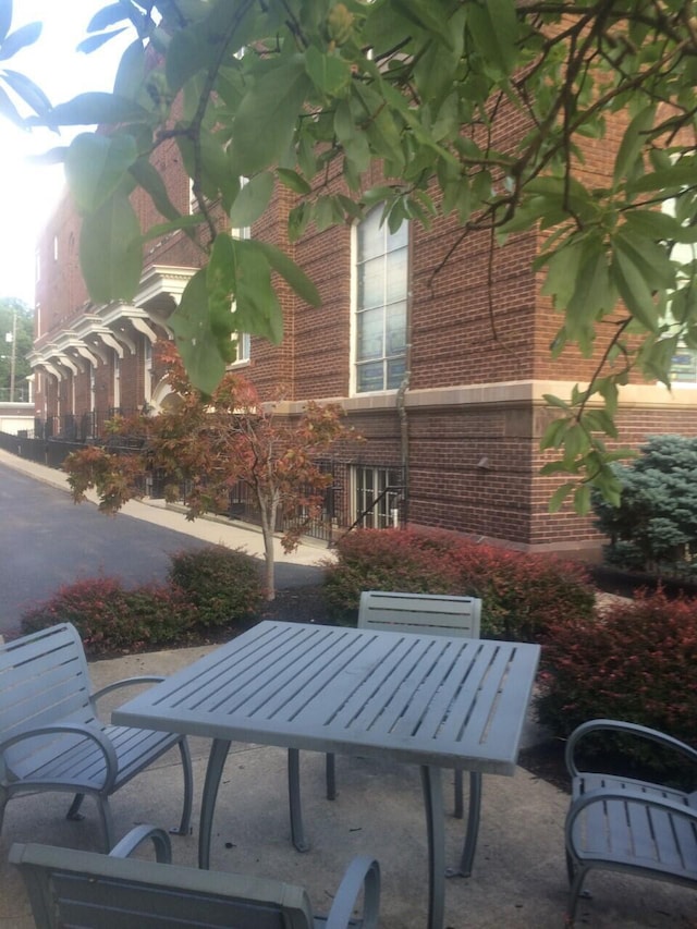 1276 N High St Unit 206, Columbus, OH 43201 - view of patio featuring outdoor dining space