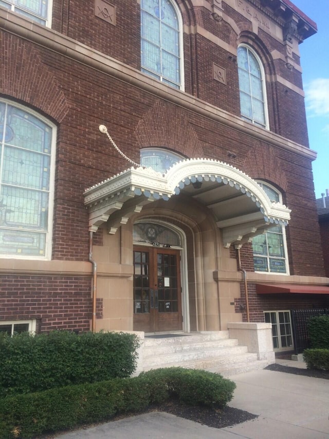 1276 N High St Unit 206, Columbus, OH 43201 - property entrance featuring french doors and brick siding