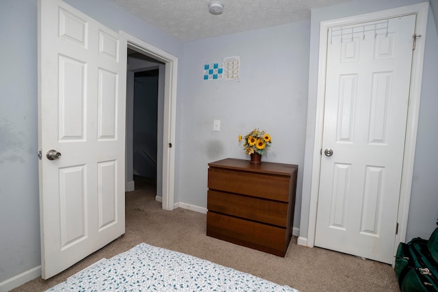 66 S Wheatland Ave, Columbus, OH 43204 - carpeted bedroom featuring baseboards and a textured ceiling