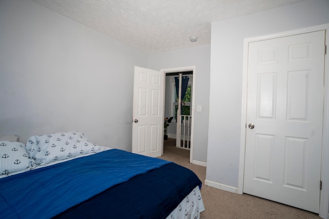 66 S Wheatland Ave, Columbus, OH 43204 - carpeted bedroom featuring baseboards and a textured ceiling