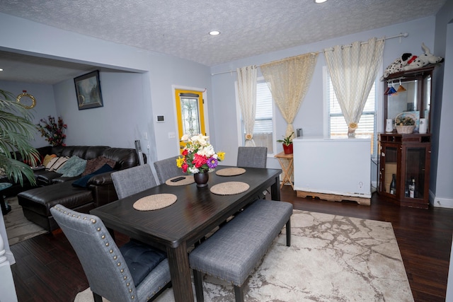 66 S Wheatland Ave, Columbus, OH 43204 - dining room featuring wood finished floors, a textured ceiling, and recessed lighting