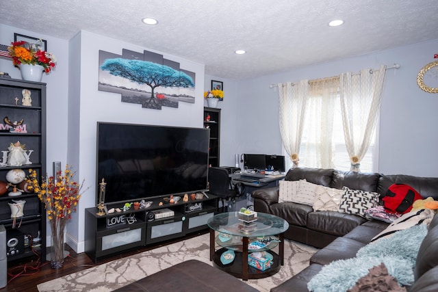 66 S Wheatland Ave, Columbus, OH 43204 - living room featuring a textured ceiling, recessed lighting, and wood finished floors