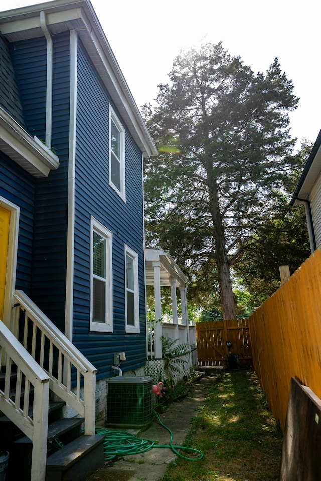 66 S Wheatland Ave, Columbus, OH 43204 - view of property exterior with a cooling unit and a fenced backyard