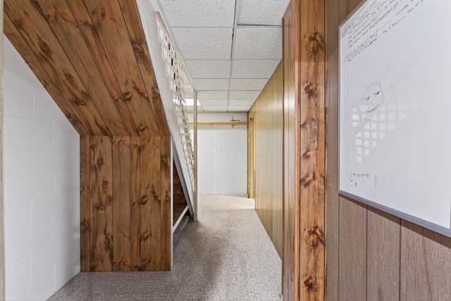 4368 Airendel Ct, Columbus, OH 43220 - hall featuring stairway, wood walls, and carpet floors