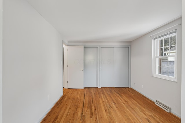 4368 Airendel Ct, Columbus, OH 43220 - unfurnished bedroom with two closets and light wood-style flooring