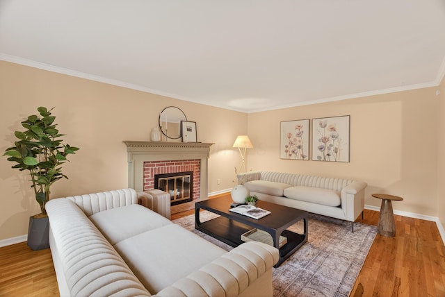4368 Airendel Ct, Columbus, OH 43220 - living room with ornamental molding, wood finished floors, and a brick fireplace