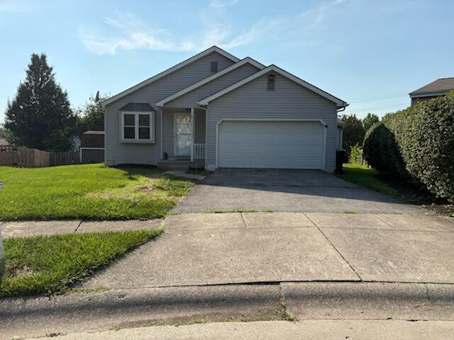 3425 Furrow Ct, Canal Winchester, OH 43110 - ranch-style house with an attached garage and driveway