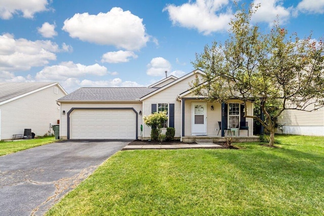 3155 El Greco Dr, Columbus, OH 43204 - view of front facade with asphalt driveway, an attached garage, covered porch, and a front yard
