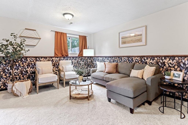 3155 El Greco Dr, Columbus, OH 43204 - carpeted living room with a wainscoted wall and a textured ceiling