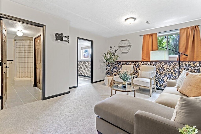 3155 El Greco Dr, Columbus, OH 43204 - living area featuring a textured ceiling and light carpet