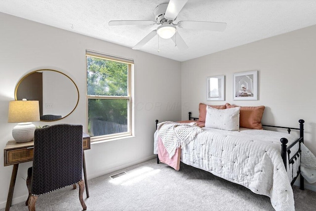 3155 El Greco Dr, Columbus, OH 43204 - bedroom featuring carpet, ceiling fan, and a textured ceiling