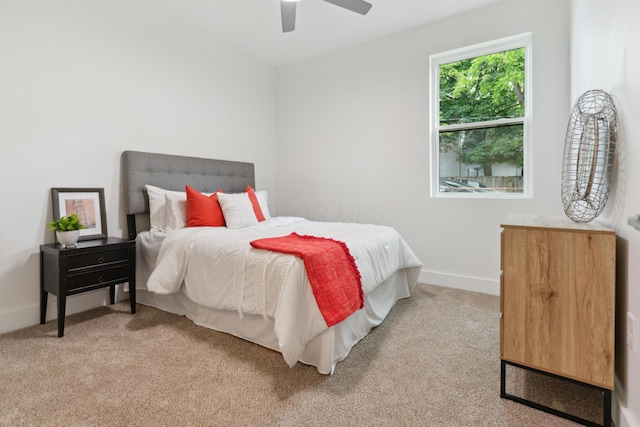 875 Bellows Ave, Columbus, OH 43223 - bedroom featuring light carpet and a ceiling fan