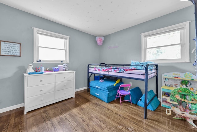 1293 Gresham Rd, Columbus, OH 43204 - bedroom with wood finished floors and baseboards